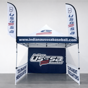 Custom printed 10x10 canopy tent set up for a youth baseball organization with matching feather flags and table cover